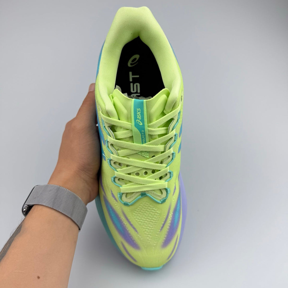 Nike Running Shoes in Volt Green, in Teal and Purple - product image from the listing.