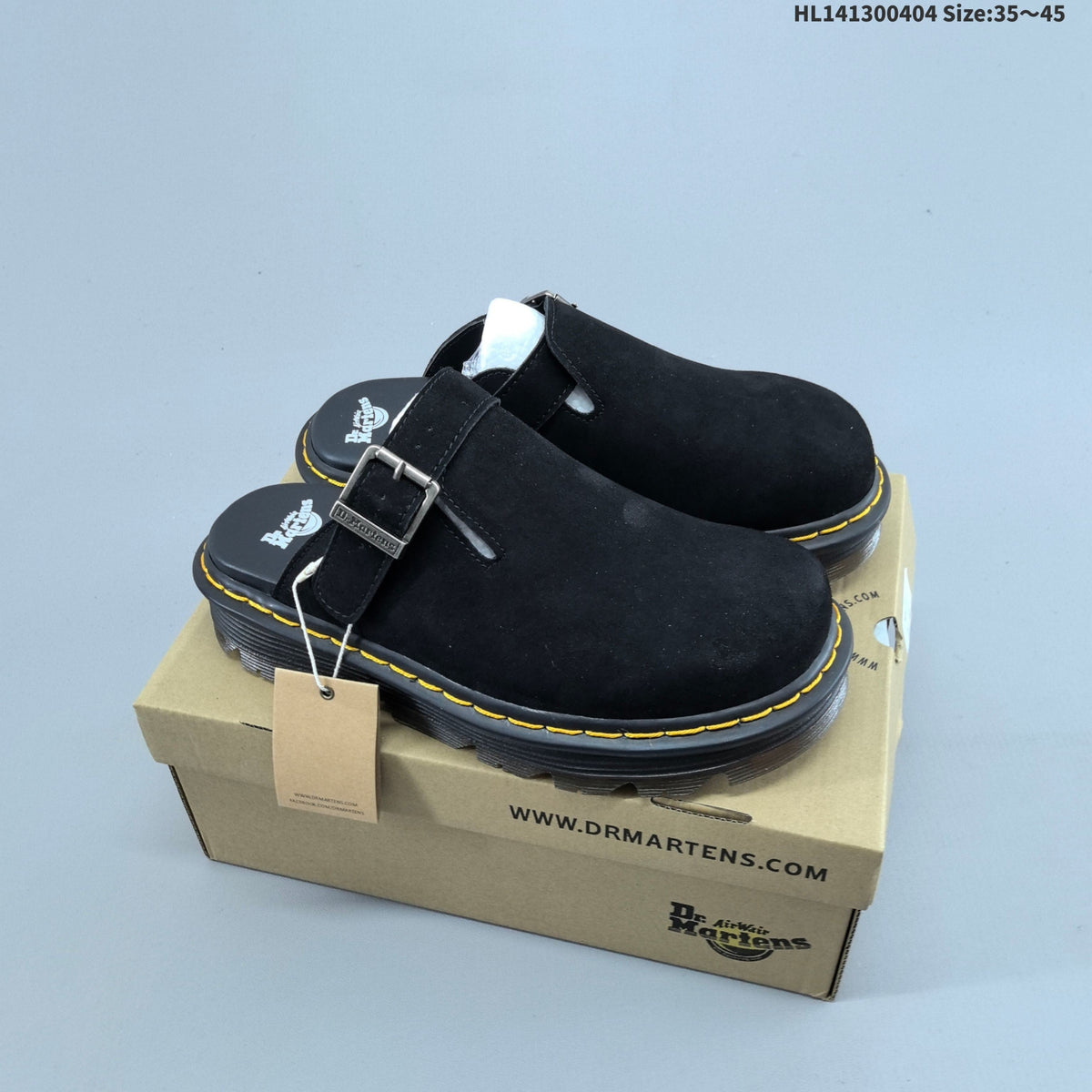 Buckle-Strap Mule Clogs in Black and Sage by Dr. Martens - product image from the listing.