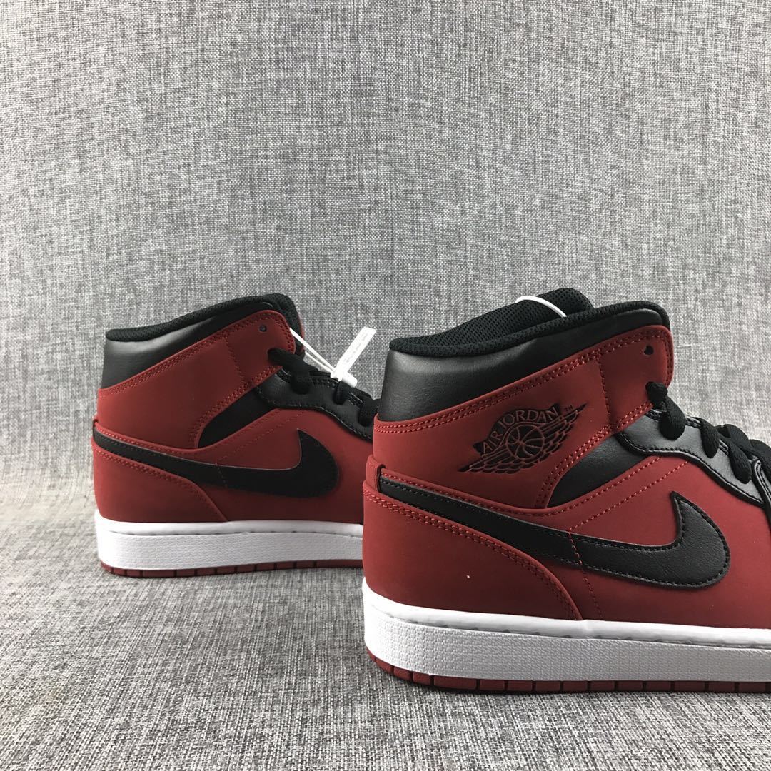 Air Jordan 1 Mid Sneakers in Red, in Black and White - product image from the listing.