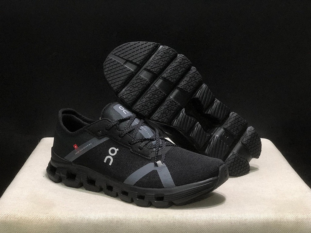 On Cloud X 4 AD Sneakers in Black - product image from the listing.