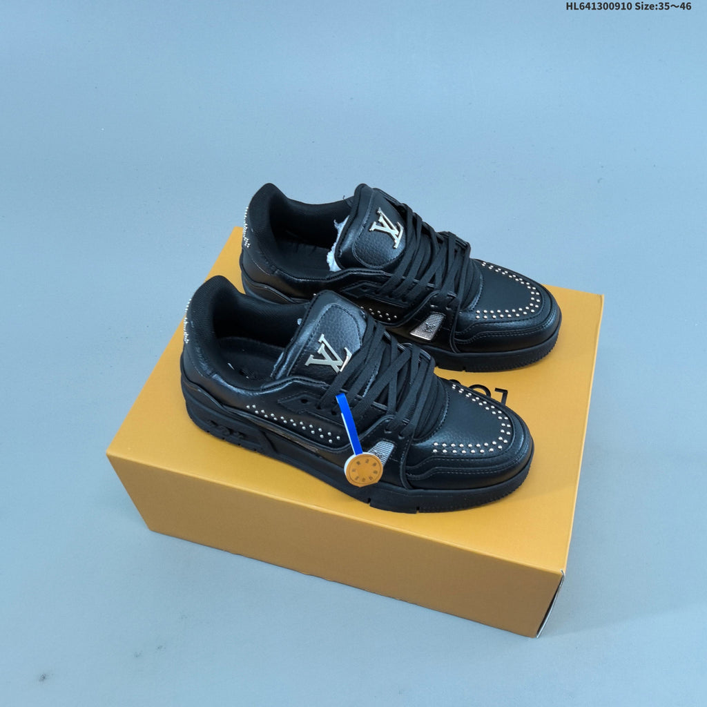 White and Black Louis Vuitton Studded Low-Top Sneakers - product image from the listing.