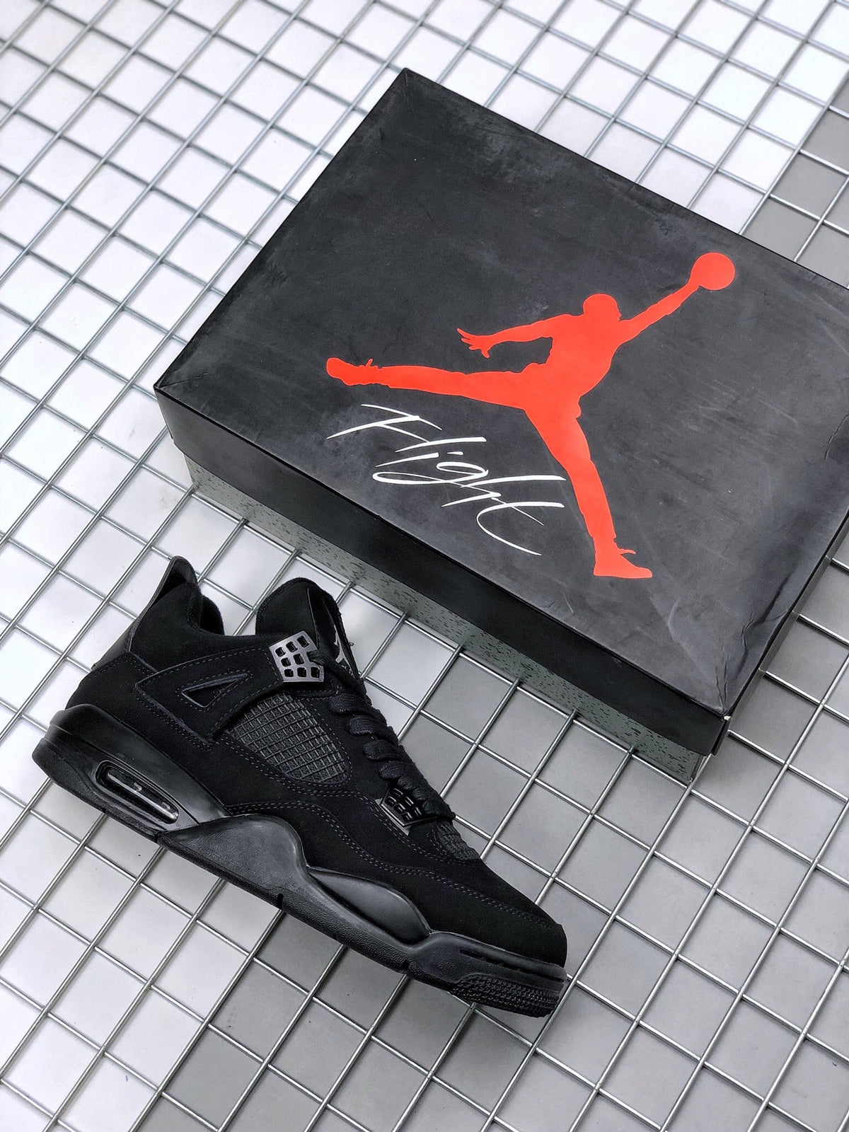 Air Jordan 4 Black Cat Sneakers CU1110-010 - product image from the listing.