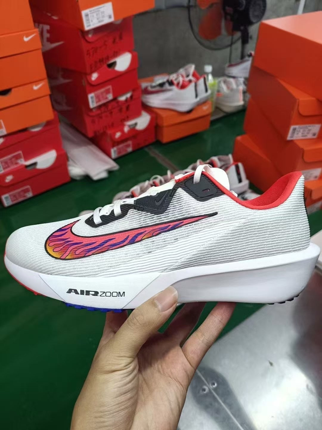 Nike Air Zoom Rival Fly 4 Running Shoes in White Red HQ3512-100 - product image from the listing.