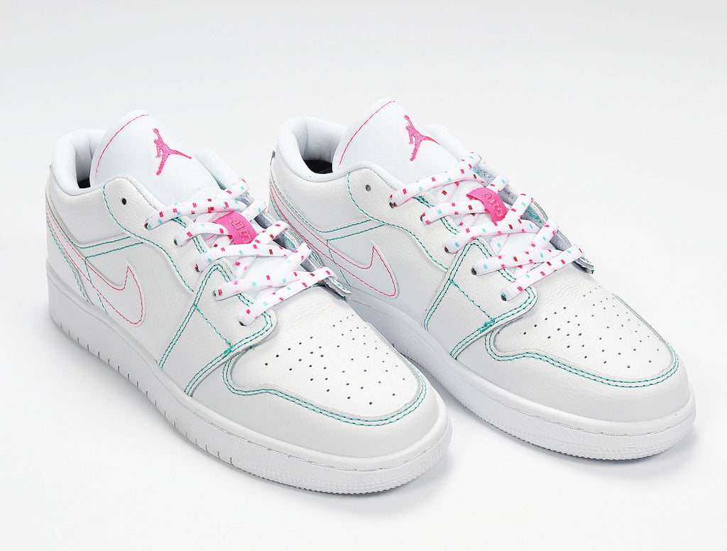 Nike Air Jordan 1 Low Sneakers in White Pink 554723-101 - product image from the listing.