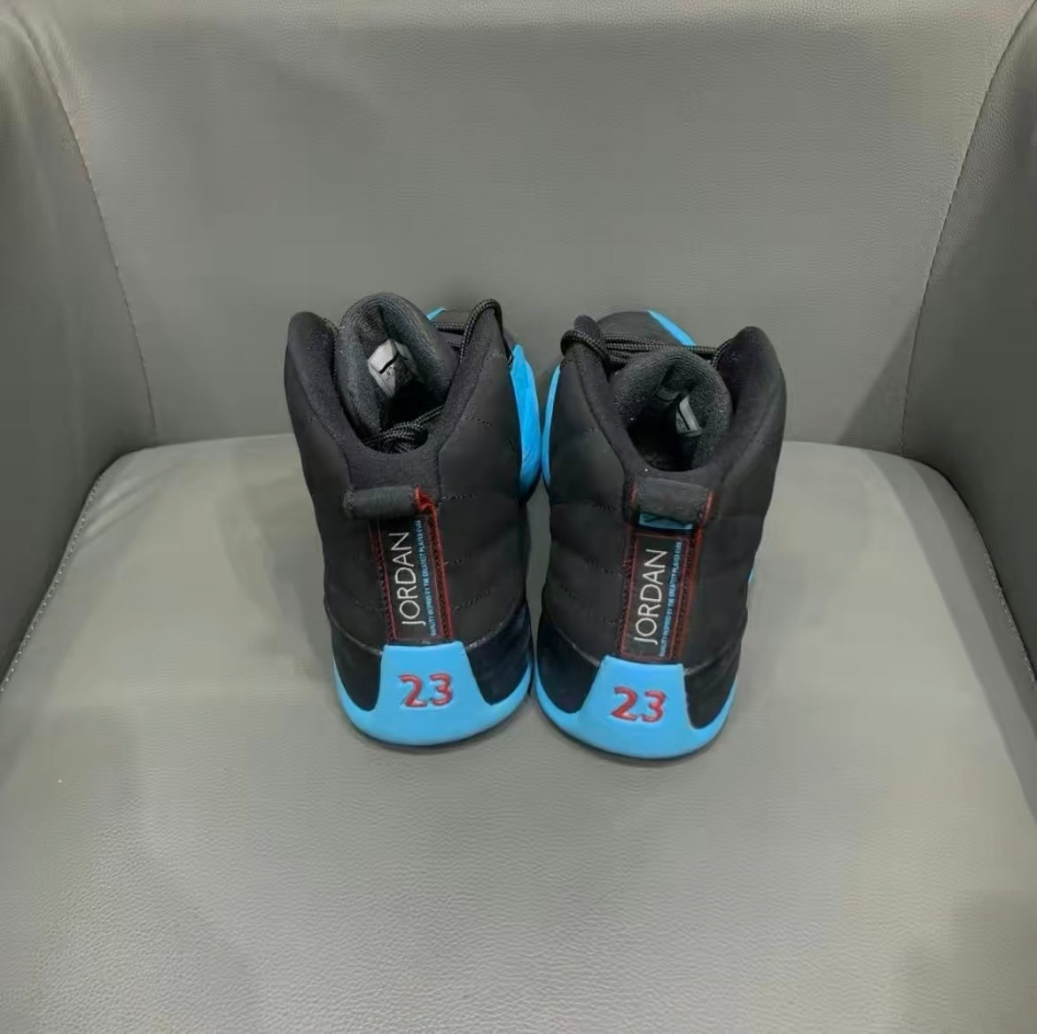 Air Jordan 12 Retro Gamma High-Top Sneakers in Blue 130690-027 - product image from the listing.