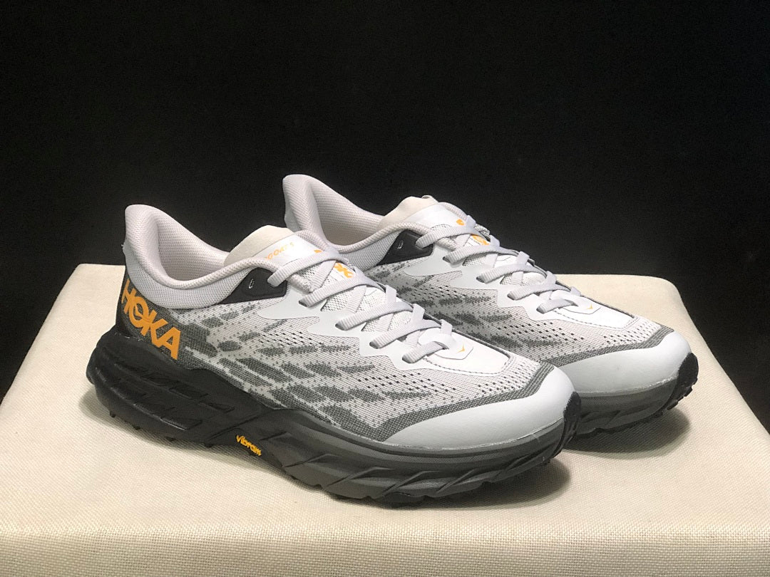 HOKA Speedgoat 5 Trail Running Shoes in White Gray - product image from the listing.
