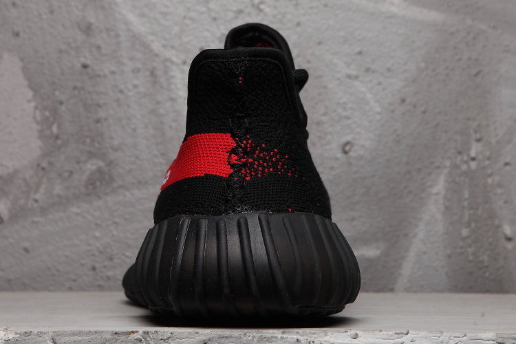 adidas Yeezy Boost 350 V2 Sneakers in Black Red - product image from the listing.