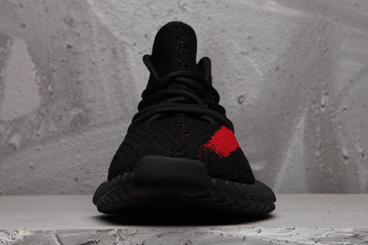 adidas Yeezy Boost 350 V2 Sneakers in Black Red - product image from the listing.