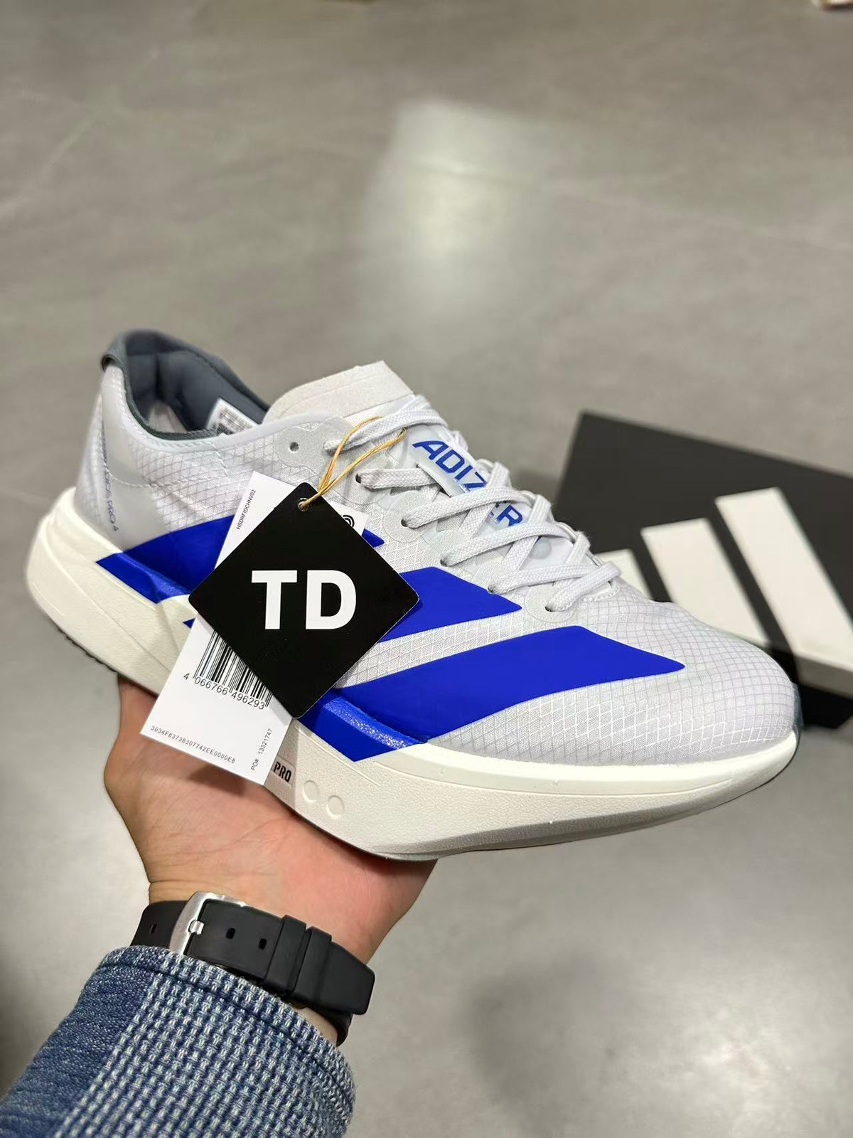 adidas Lightstrike Pro Running Shoes in White Blue - product image from the listing.