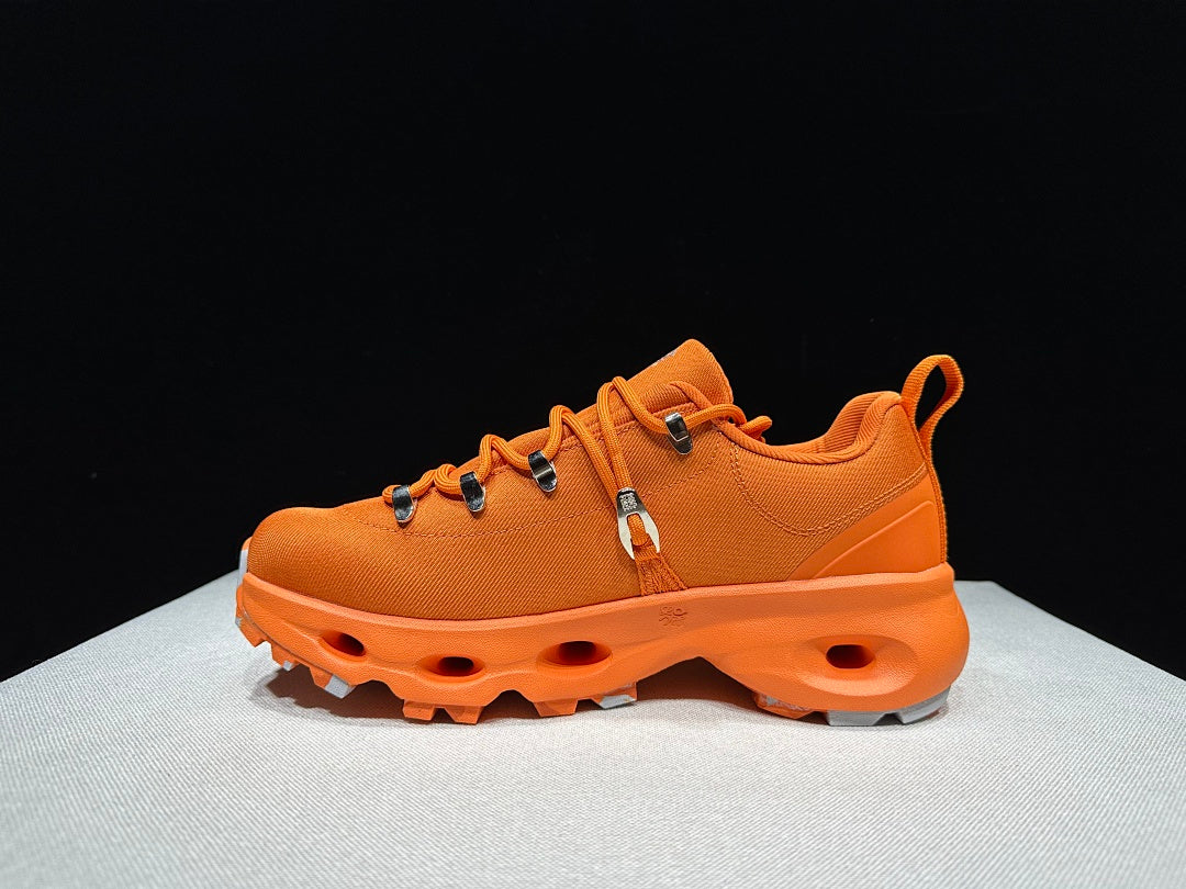 On x Loewe Cloudsurfer Orange Trail Trainers - product image from the listing.