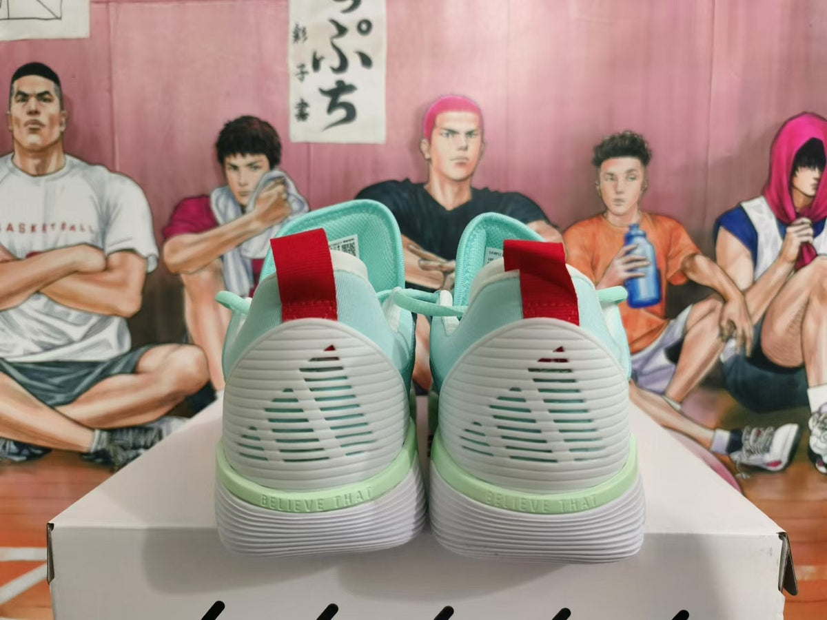 Mint Green and White Basketball Sneakers - product image from the listing.