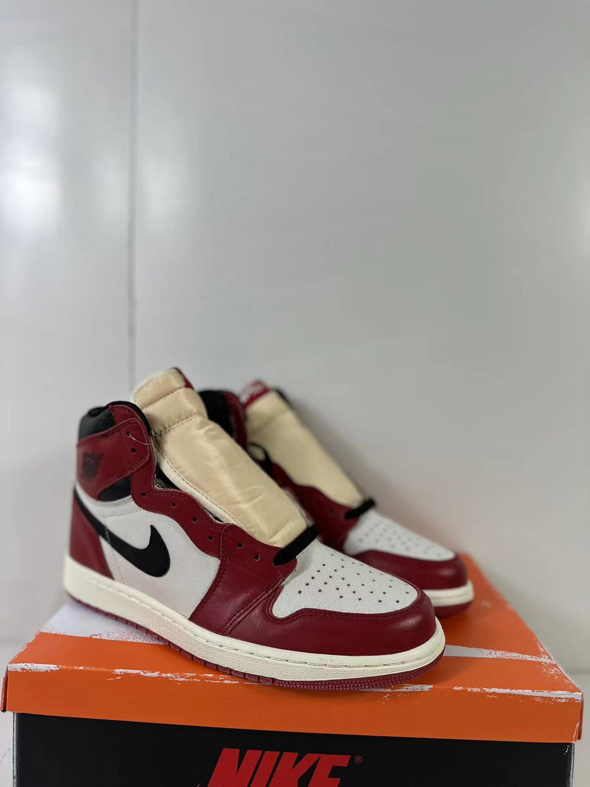 Air Jordan 1 Retro High OG Lost & Found Sneakers - product image from the listing.