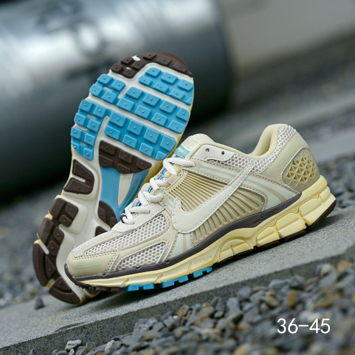 Pale Green and Blue Nike Air Zoom Vomero 5 Sneakers - product image from the listing.