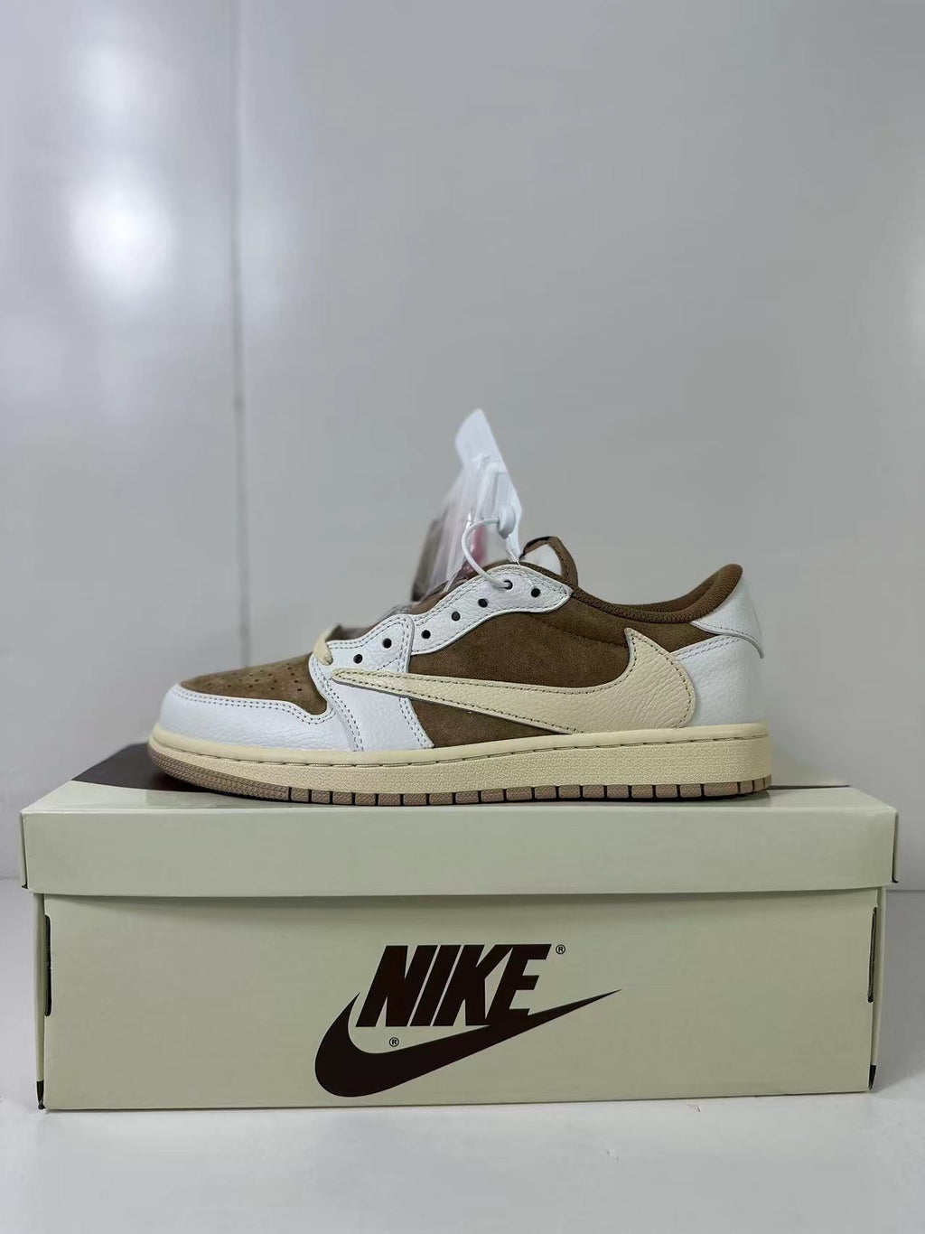 Travis Scott x Air Jordan 1 Low Reverse in Mocha Pink DM7866-106 - product image from the listing.