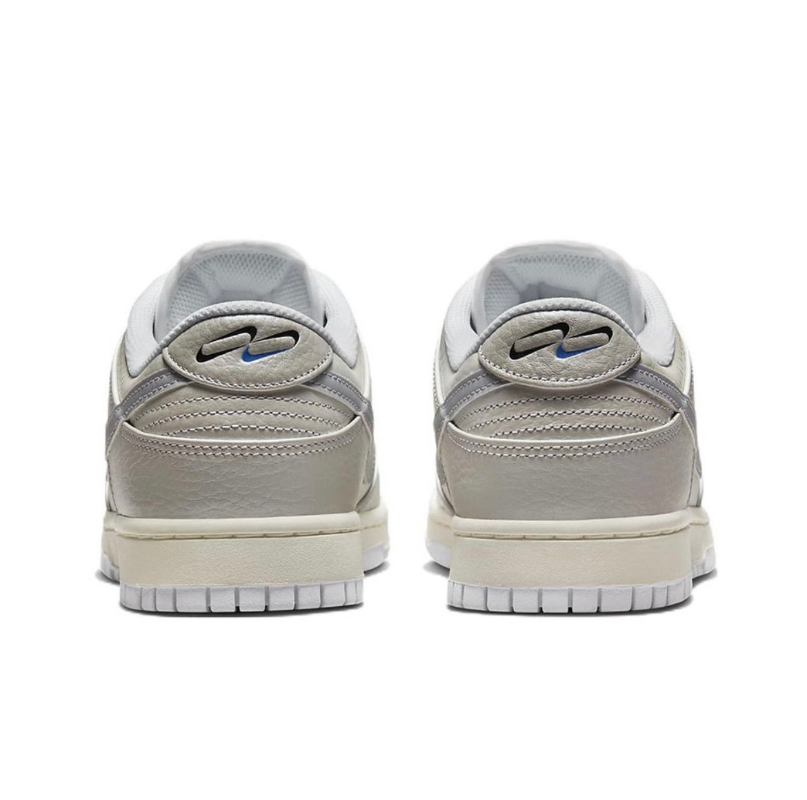 Nike Dunk Low Sneakers in Metallic Silver DX3197-095 - product image from the listing.