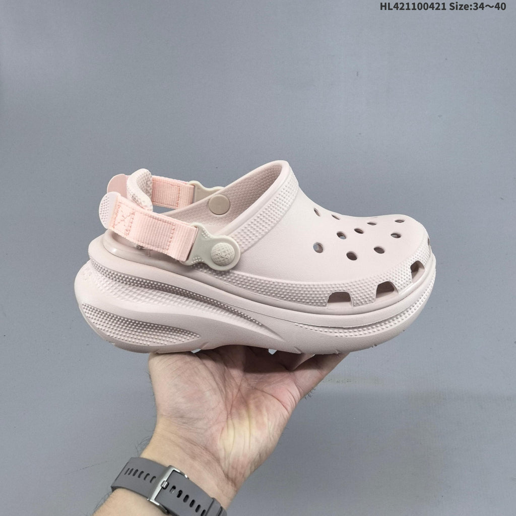 Platform Clogs with Vent Holes and Heel Straps by Crocs - product image from the listing.