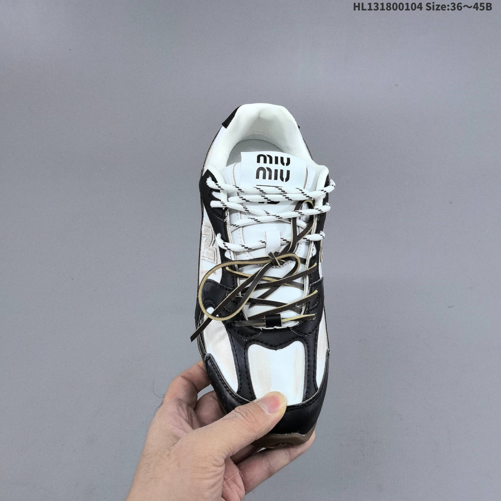 Black and White New Balance 530 SL Low-Top Sneakers - product image from the listing.
