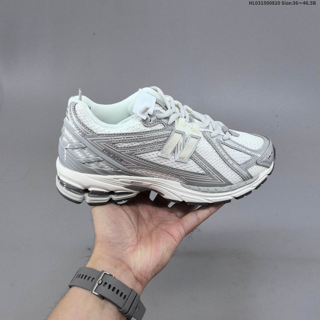 New Balance 1906R Sneakers in White Silver U1906RJM - product image from the listing.