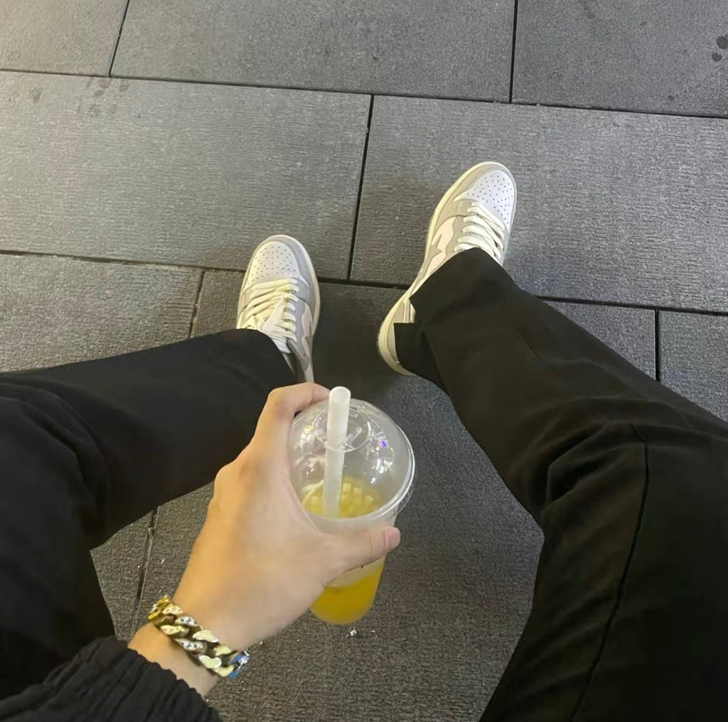 A BATHING APE BAPE Court Sta Low Sneakers in White Grey - product image from the listing.