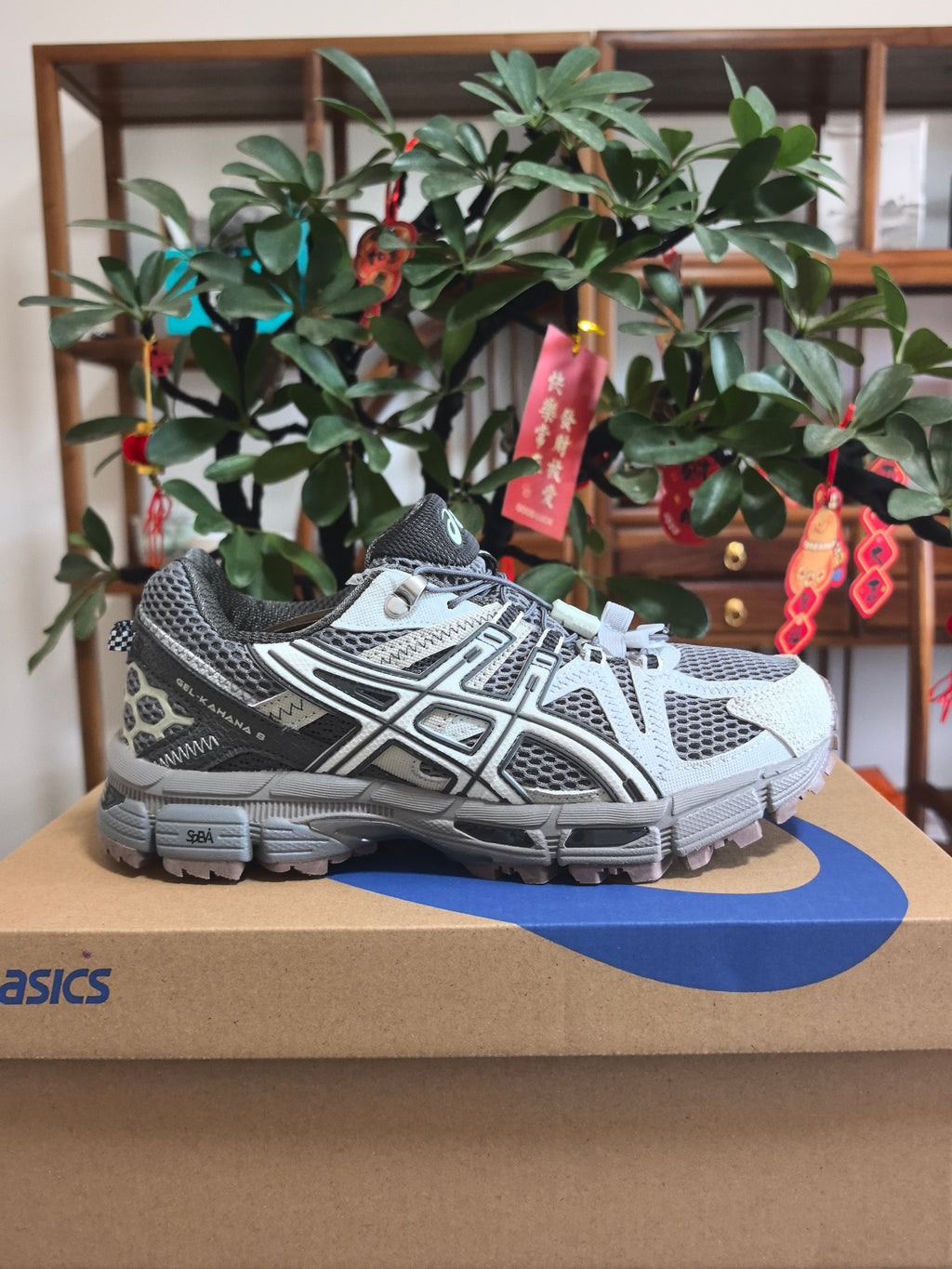 ASICS GEL-KAYANO 14 Sneakers in Black and White - product image from the listing.