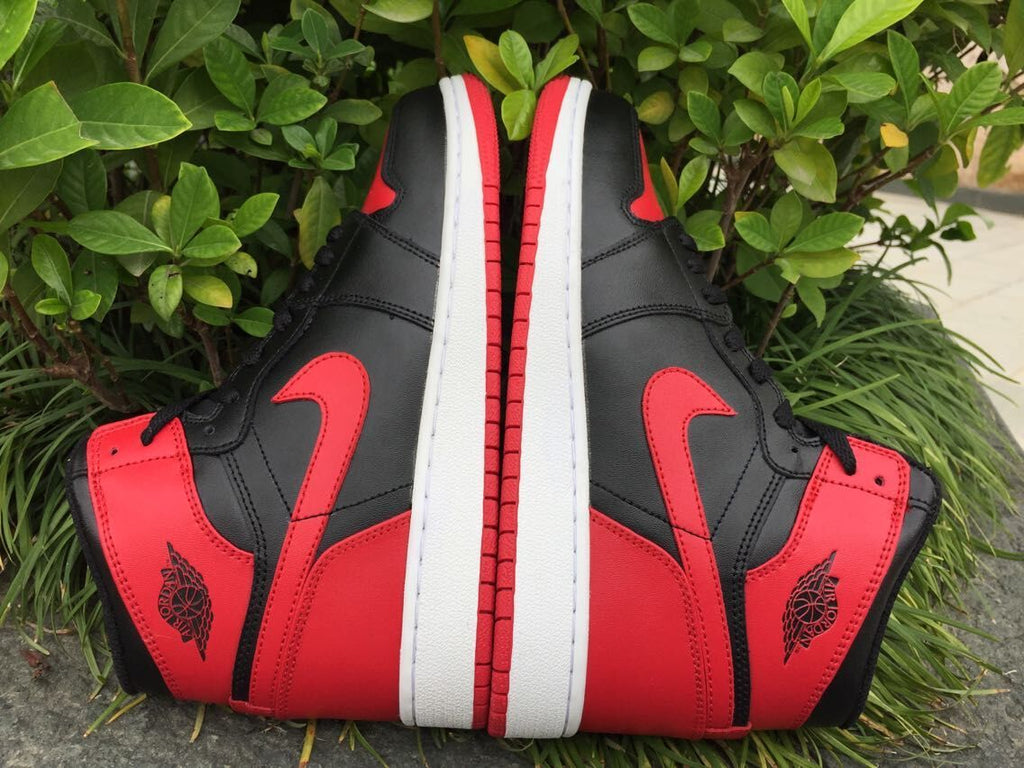 Air Jordan 1 High Sneakers in Black Red White - product image from the listing.