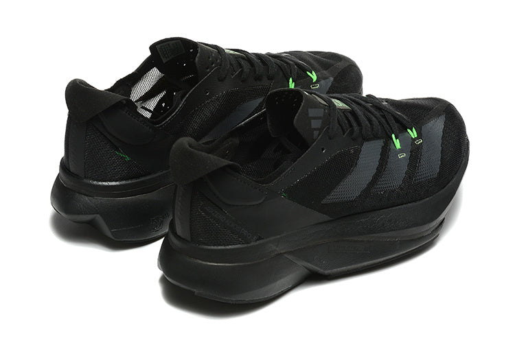Adidas Adizero Shoes for Running, Black with Green Accents - product image from the listing.