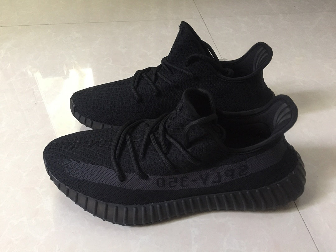 Adidas Yeezy Boost 350 V2 Sneakers in Black Knit - product image from the listing.