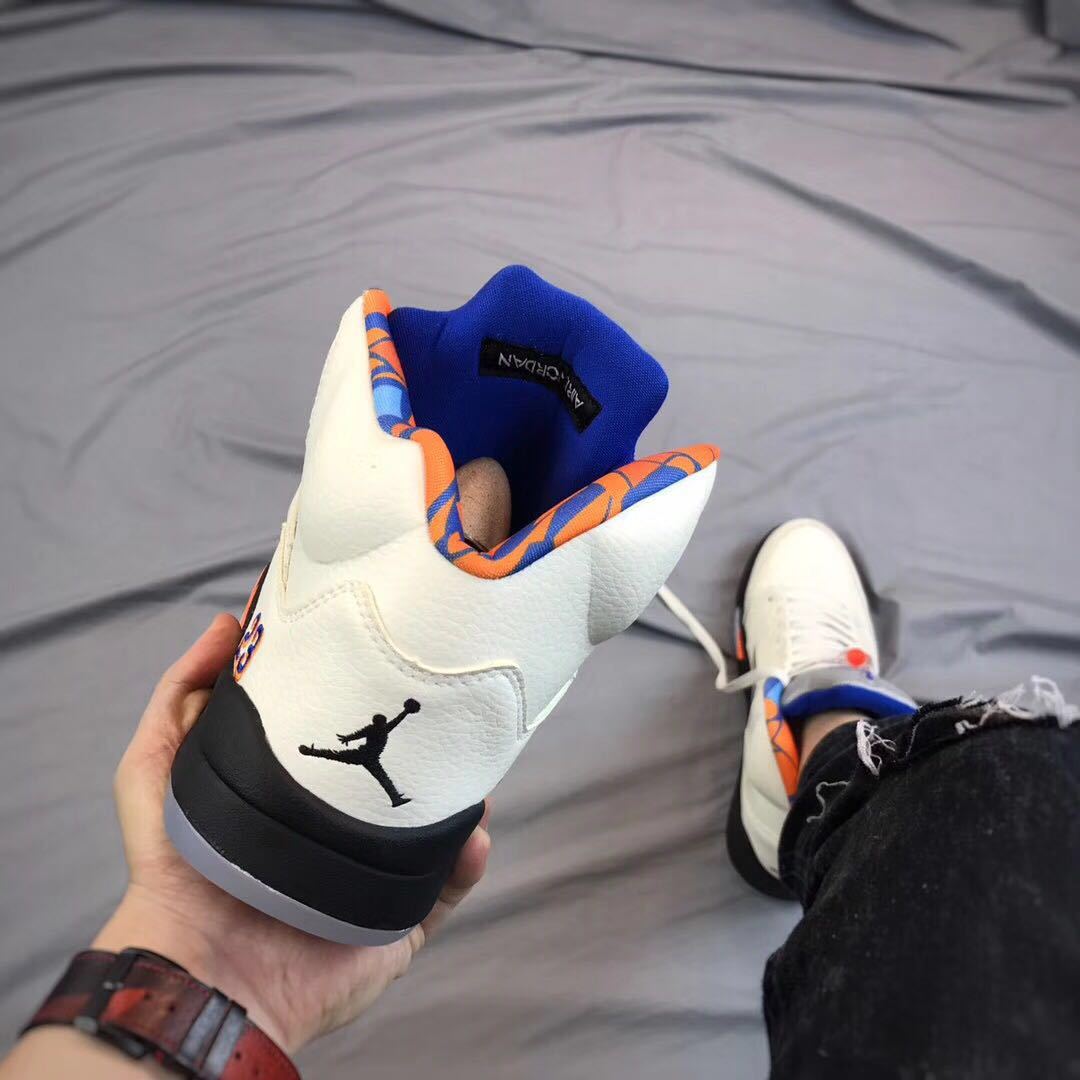Air Jordan 5 International Flight White Orange Blue Sneakers - product image from the listing.