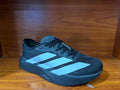 Adizero Shoes for Running in Black with Light Blue Stripes - product image from the listing.