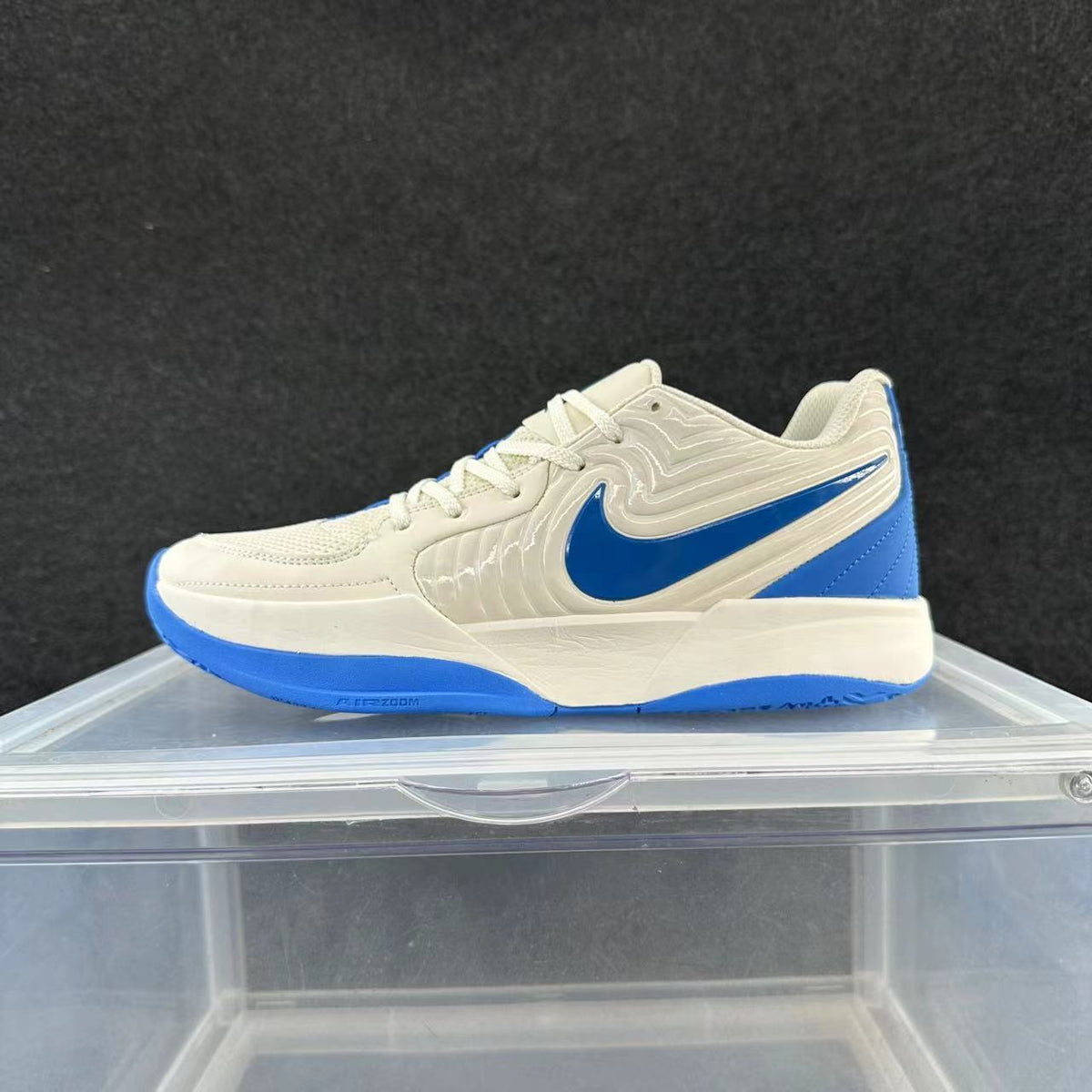Nike Sneakers in Cream and Blue - product image from the listing.