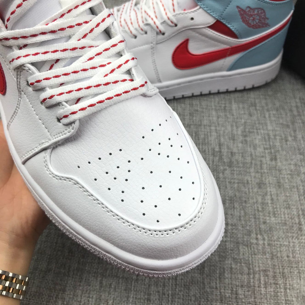 Air Jordan 1 Mid Sneakers in Ice Blue White and Red 555112-104 - product image from the listing.