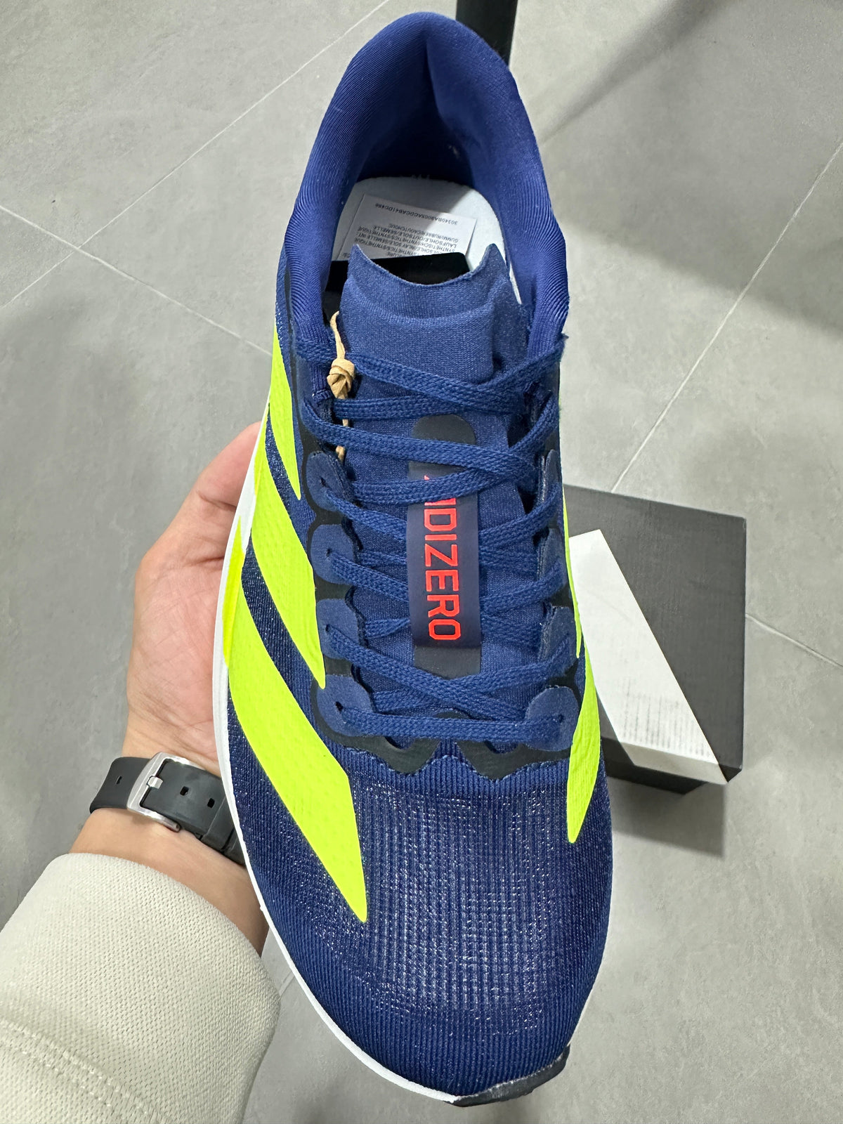 Adidas Lightstrike Pro Running Shoes in Navy Volt - product image from the listing.