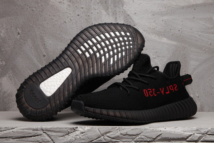 adidas Yeezy Boost 350 V2 Sneakers in Black - product image from the listing.
