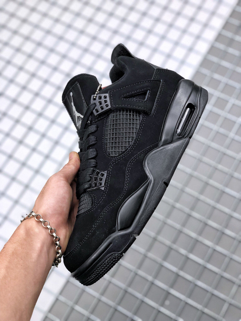 Air Jordan 4 Black Cat Sneakers CU1110-010 - product image from the listing.