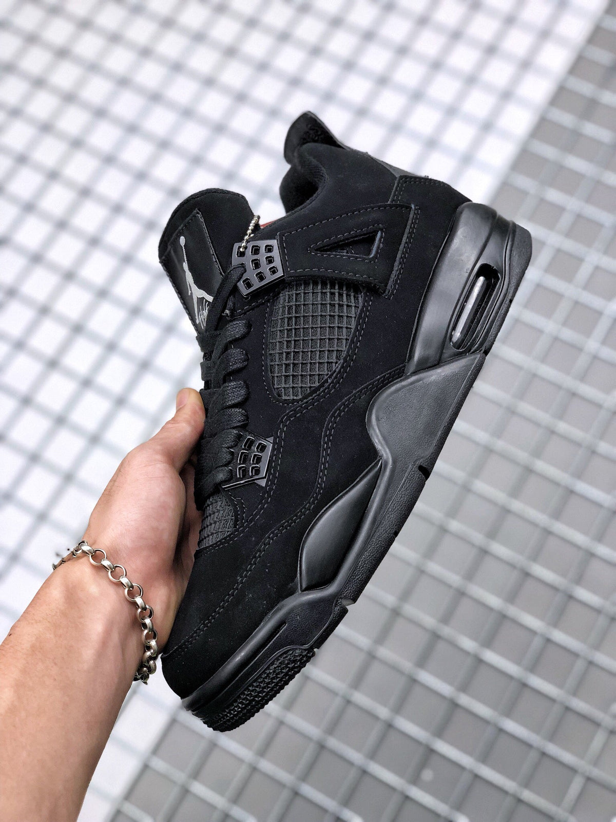 Air Jordan 4 Black Cat Sneakers CU1110-010 - product image from the listing.