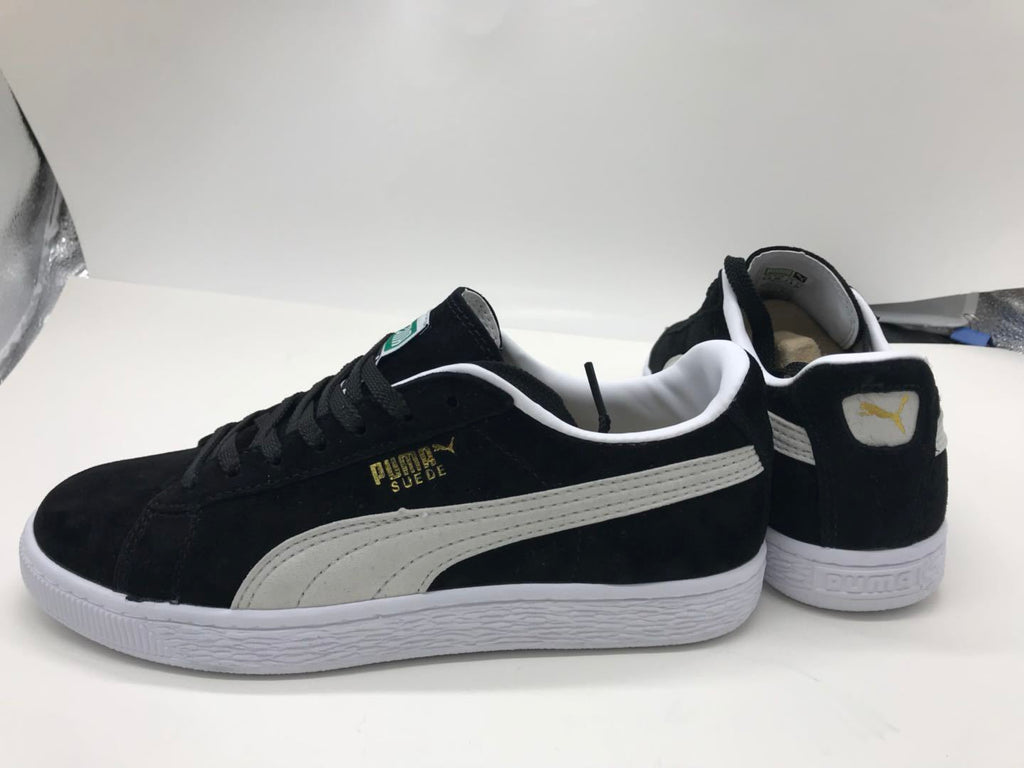 Puma Low-Top Sneakers in Suede Black and White - product image from the listing.