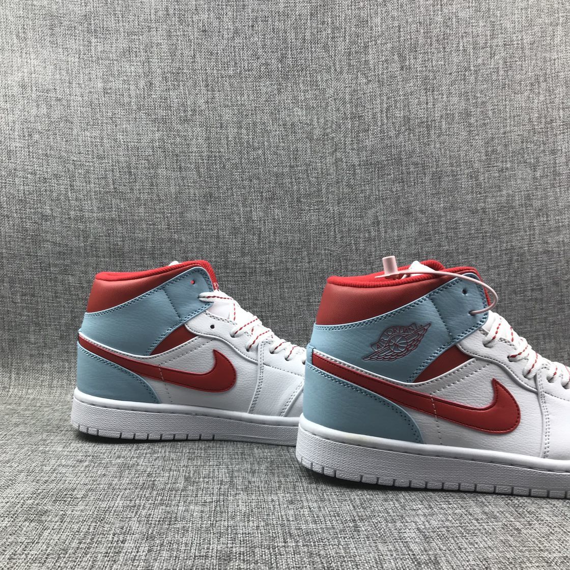 Air Jordan 1 Mid Sneakers in Ice Blue White and Red 555112-104 - product image from the listing.