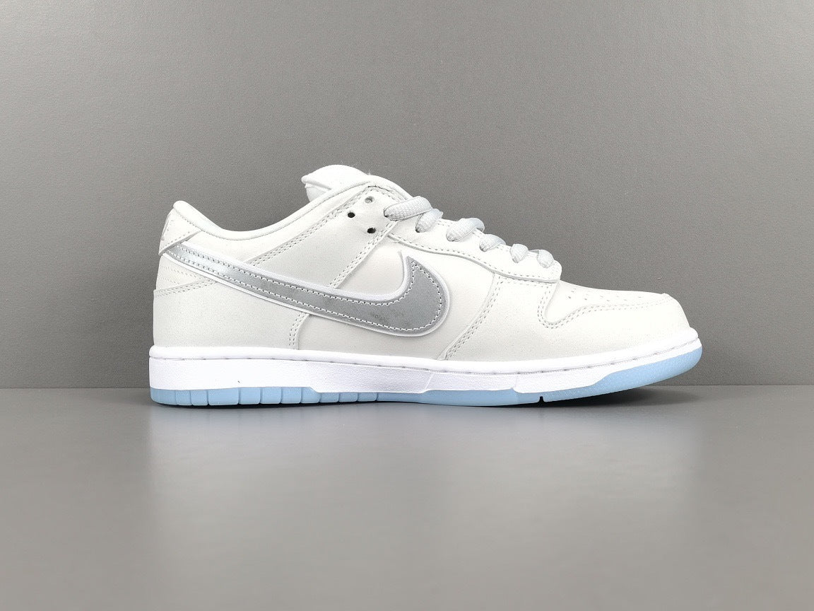 Nike Dunk Low SB Purple Lobster Sneakers in White FD8776-100 - product image from the listing.