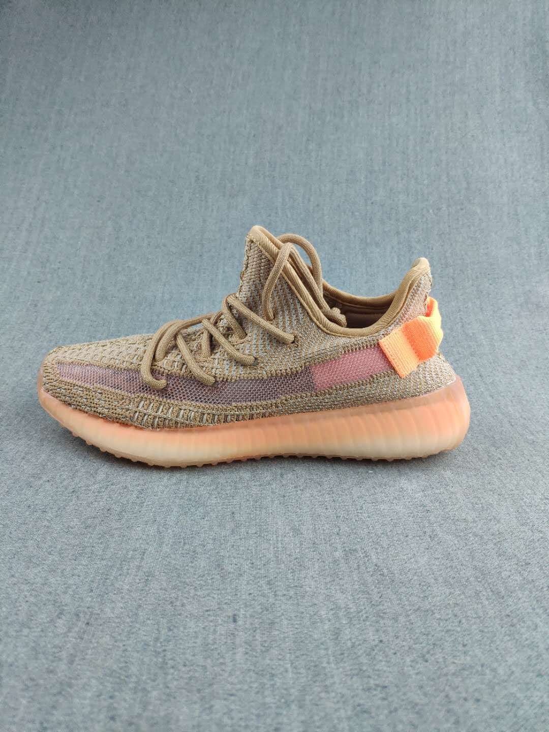 Gray and Coral Yeezy 350 V2 Knit Sneakers - product image from the listing.