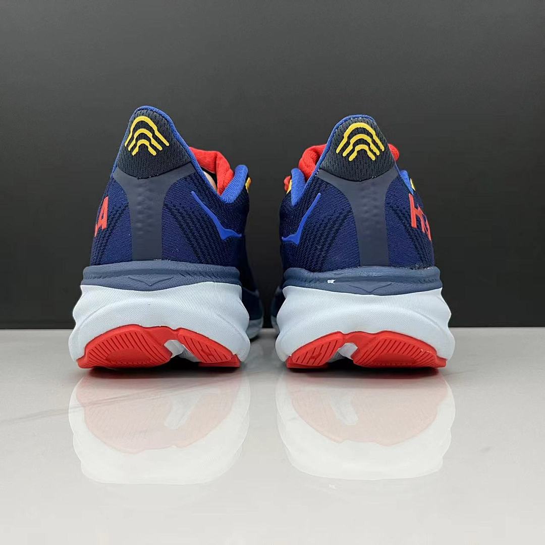 HOKA Clifton 9 Running Shoes in Navy, in Red and Yellow - product image from the listing.