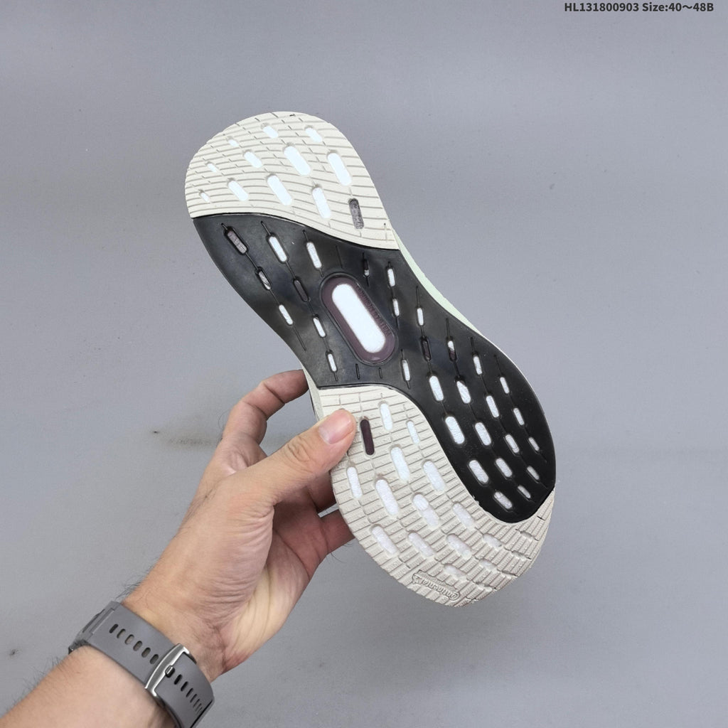 Adidas Ultraboost 5 Running Shoes, in Charcoal and Cream - product image from the listing.