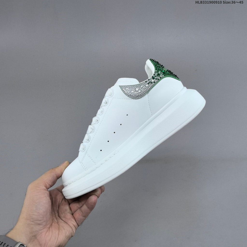 Alexander McQueen Oversized Low-Cut Sneakers with Crystal Heel - product image from the listing.