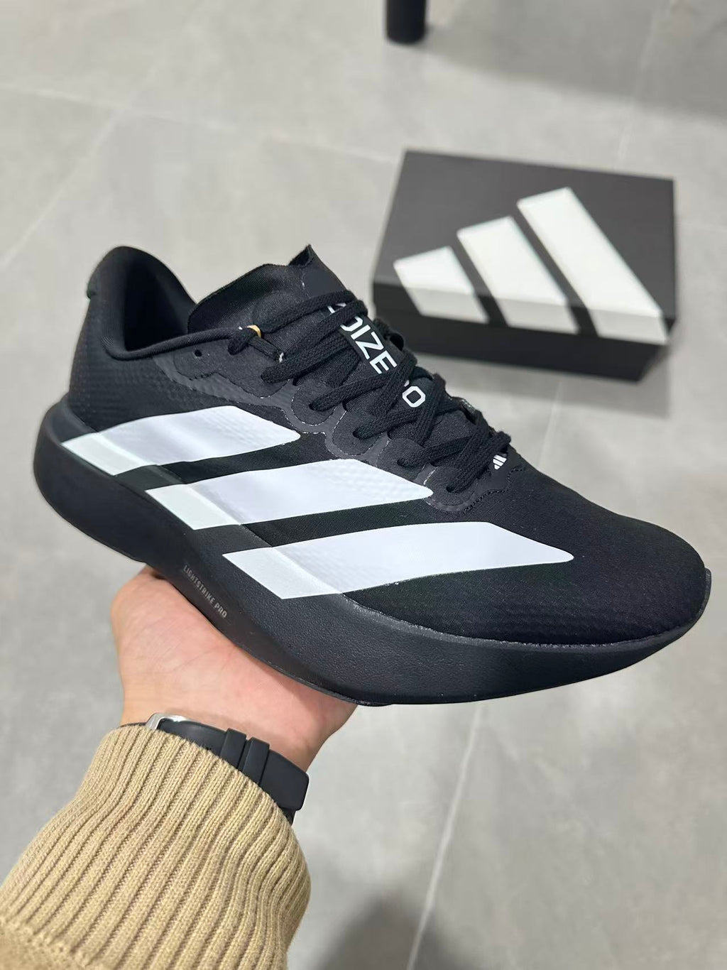 Adidas Lightstrike Pro Running Shoes in Black White KJ3595 - product image from the listing.