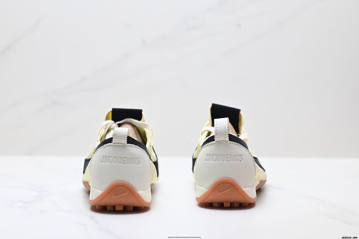Pale Yellow and Black Nike x Jacquemus Sneakers - product image from the listing.