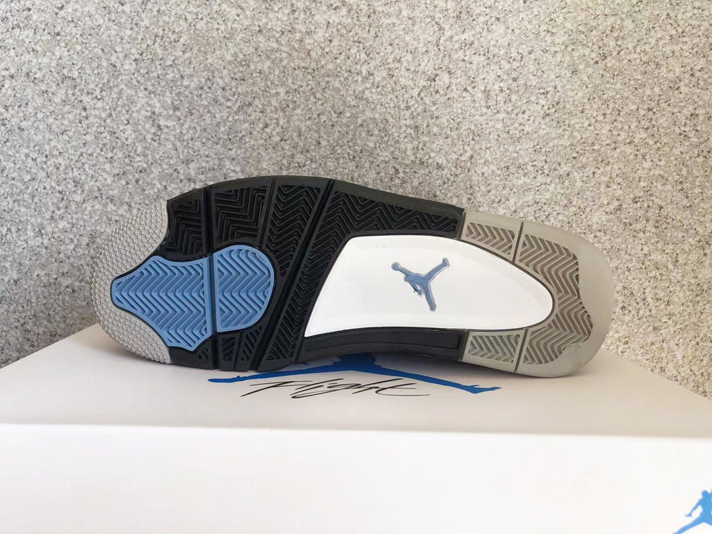 Jordan 4 Sneakers in University Blue - product image from the listing.