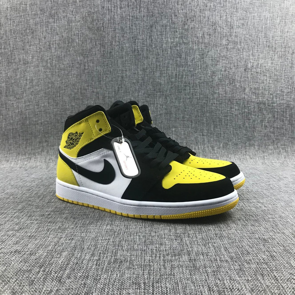 Black Yellow Toe Sneakers - Air Jordan 1 Mid SE 852542-071 - product image from the listing.