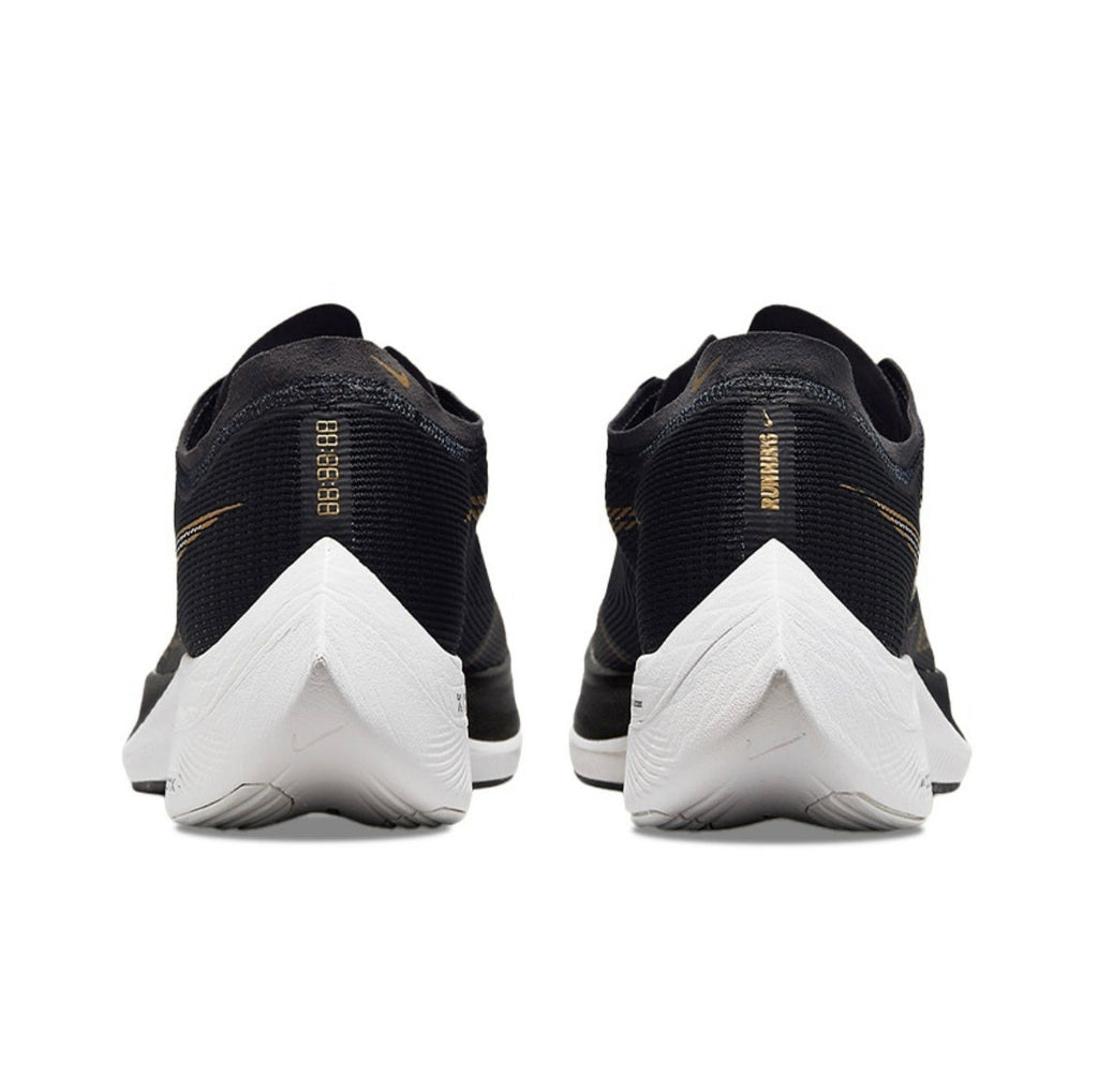 Nike ZoomX Vaporfly NEXT% 2 Running Shoes in Black Gold CU4111-001 - product image from the listing.