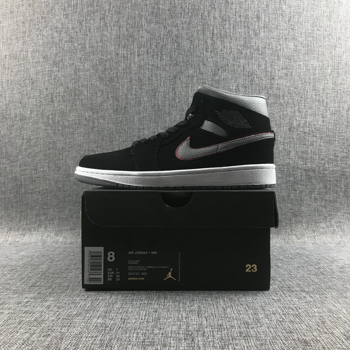 Air Jordan 1 Mid Sneakers in Black Grey Red 554724-060 - product image from the listing.