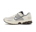 Metallic Silver and White Nike Vomero 5 Sneakers - product image from the listing.