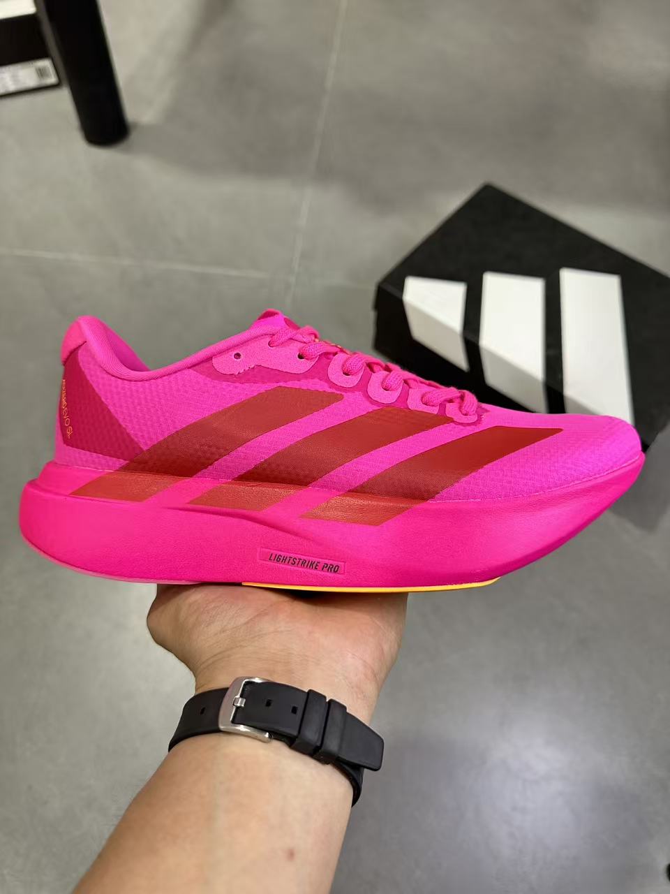 Magenta adidas Lightstrike Pro Running Shoes KI6902 - product image from the listing.